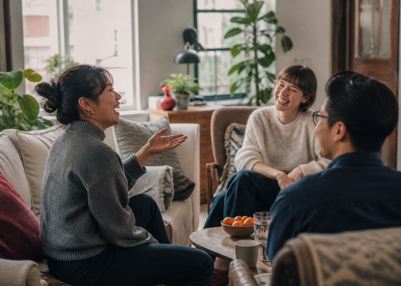 Colleagues talking in an office lounge